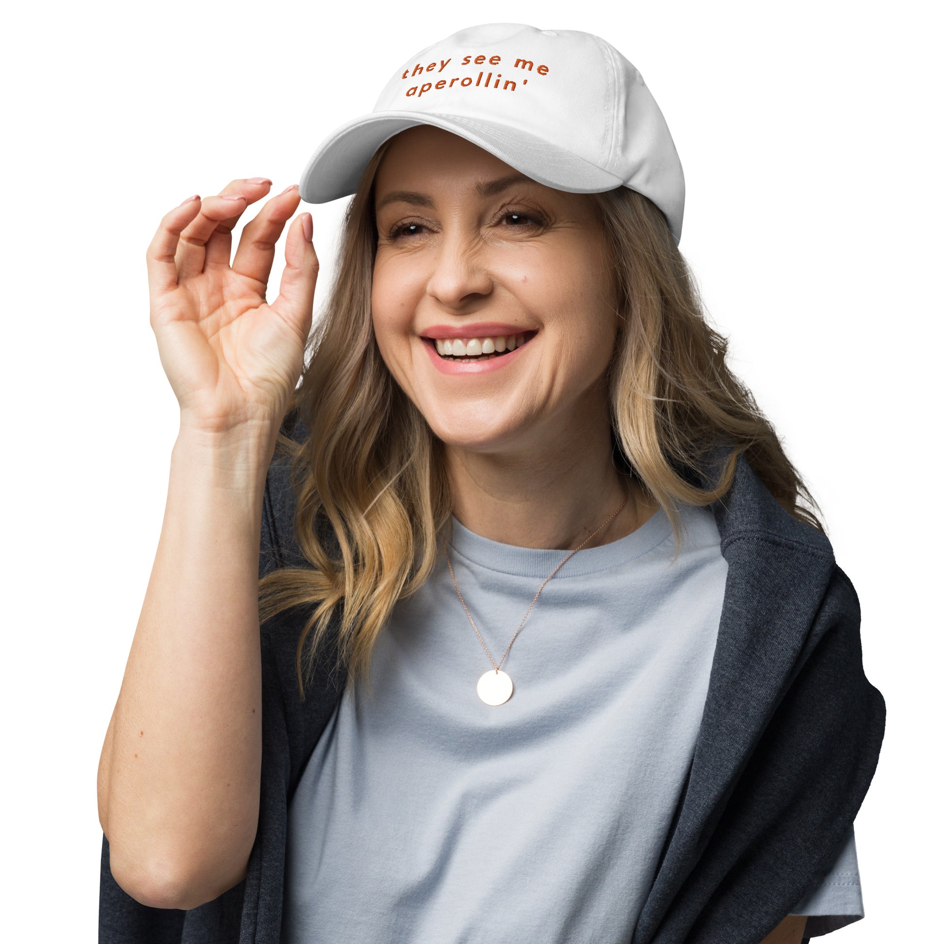 they-see-me-aperollin-classic-dad-cap in Pink Classic dad cap with embroidered witty quote – Stay Witty classic baseball hat with adjustable strap and curved brim.