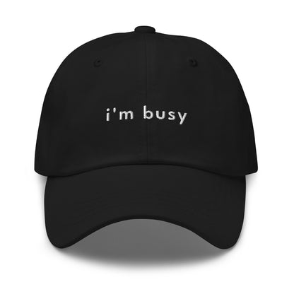 im-busy-classic-dad-cap in Black Classic dad cap with embroidered witty quote – Stay Witty classic baseball hat with adjustable strap and curved brim.