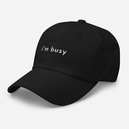 im-busy-classic-dad-cap in Navy Classic dad cap with embroidered witty quote – Stay Witty classic baseball hat with adjustable strap and curved brim.