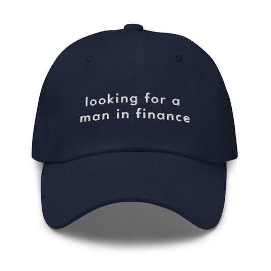 man-in-finance-classic-dad-cap in Black Classic dad cap with embroidered witty quote – Stay Witty classic baseball hat with adjustable strap and curved brim.