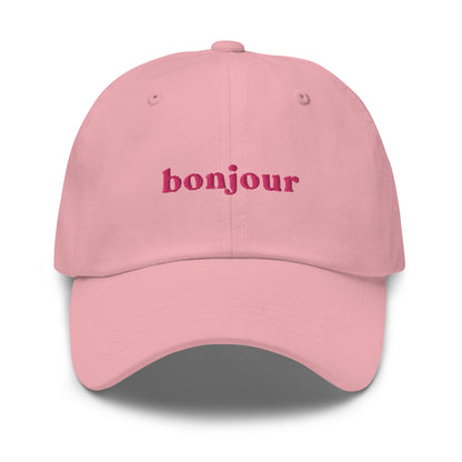 bonjour-au-revoir-classic-dad-cap in Light Blue Classic dad cap with embroidered witty quote – Stay Witty classic baseball hat with adjustable strap and curved brim.