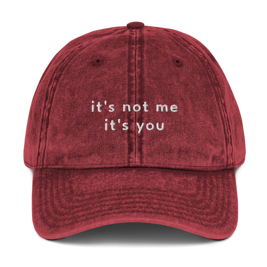 its-not-me-its-you-vintage-dad-cap-1 in Black Classic dad cap with embroidered witty quote – Stay Witty classic baseball hat with adjustable strap and curved brim.